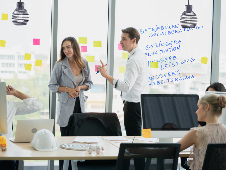 group of business people meeting and discussing a project at meeting room with computer.