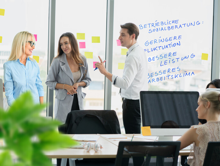 group of business people meeting and discussing a project at meeting room with computer.